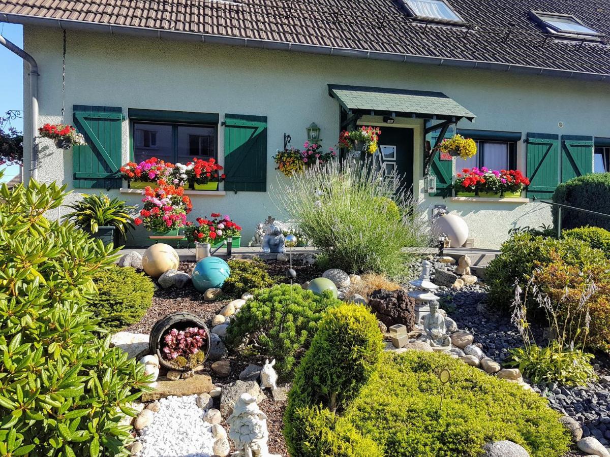 Séjour chez l'habitant Le Nid Fleuri De