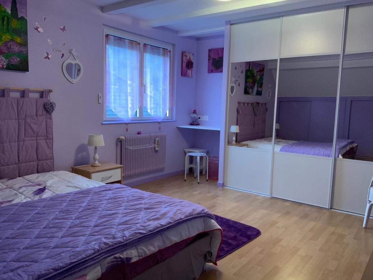 Séjour chez l'habitant Le Nid Fleuri De *